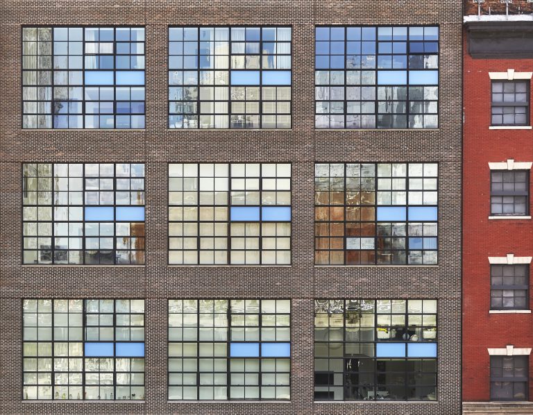 Facade of an old building in downtown New York, USA.